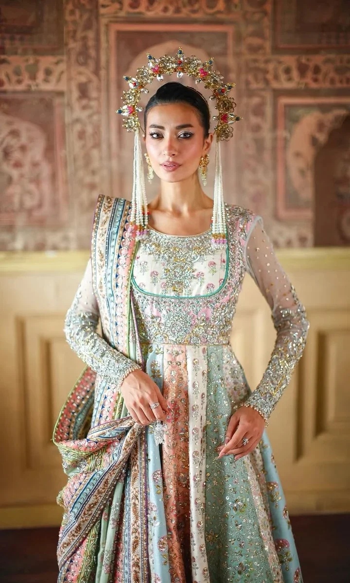 NOMI ANSARI – MARYAM NAWAZ SHARIF clothing in pink, mint tones.